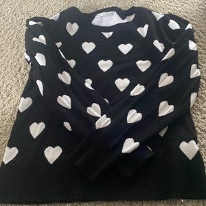 Gently used, black and white heart sweater